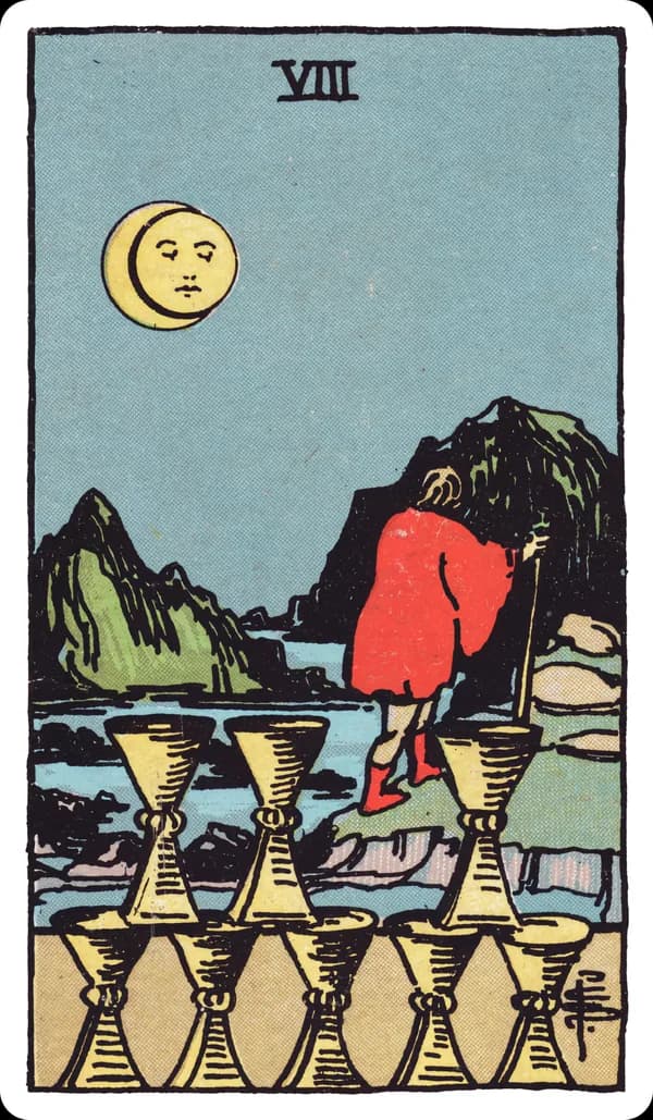 The Eight of Cups from the Rider-Waite-Smith deck: a cloaked figure walks away at night, leaning on a staff, leaving behind eight cups stacked in a careful arrangement with one visibly missing from the top row, beneath a partially eclipsed moon and distant mountains.