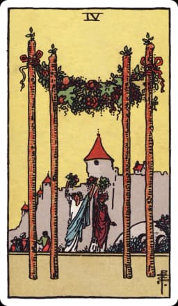 The Four of Wands from the Rider-Waite-Smith deck: two small figures raise garlands of flowers overhead beneath a canopy strung between four tall wands planted in the foreground, a crowd gathers near a castle in the background, the whole scene lit like an outdoor celebration.