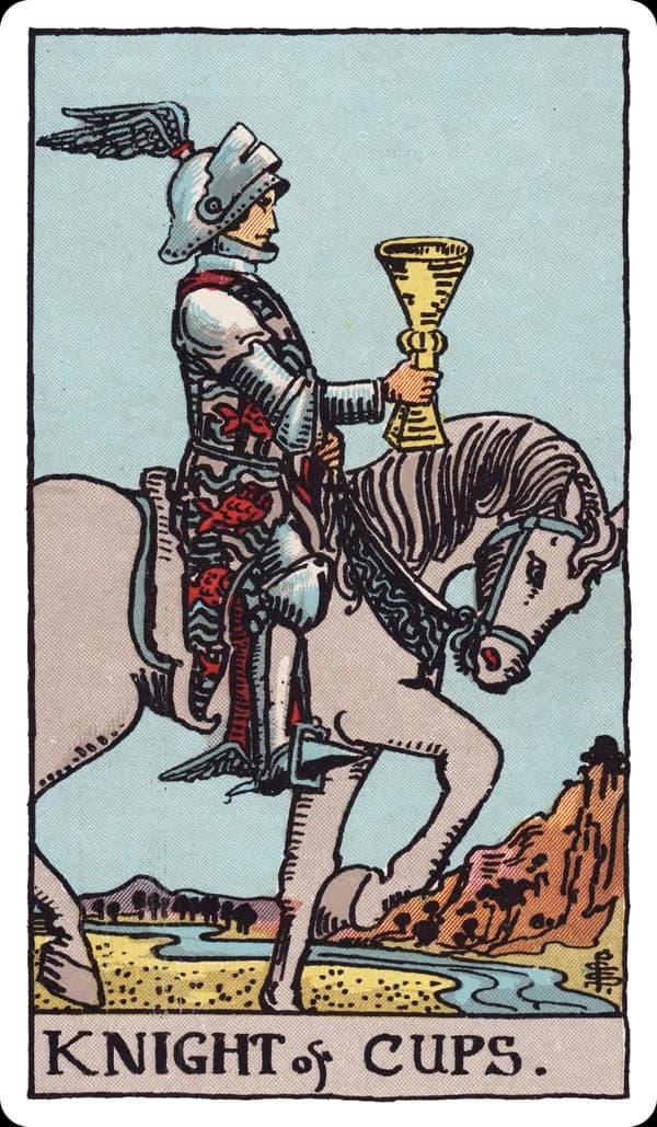 The Knight of Cups from the Rider-Waite-Smith deck: a knight in ornate armor, with wings adorning his helmet and heels, rides a calm white horse at a slow, deliberate pace beside a stream, holding a golden cup out before him as if extending an offer.