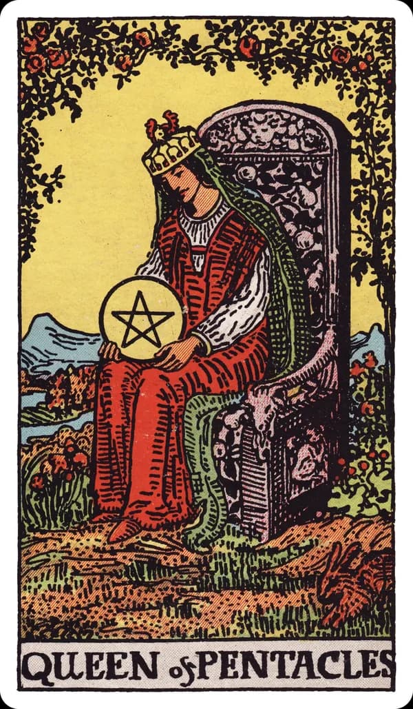 The Queen of Pentacles from the Rider-Waite-Smith deck: a queen sits on a throne carved with fruit, flowers, and a goat's head, holding a large pentacle cradled in her lap, a rabbit visible in the grass nearby, a lush garden of blooming roses and greenery surrounding her.