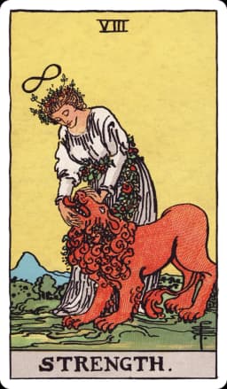 Strength from the Rider-Waite-Smith deck: a woman in a flowing white gown gently closes the jaws of a lion with her bare hands, a lemniscate (infinity symbol) floating above her head, a garland of flowers wound around her waist, calm mountains and a soft yellow sky in the background.