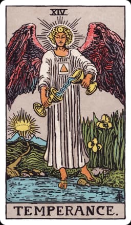 Temperance from the Rider-Waite-Smith deck: a winged, androgynous angel stands with one foot on solid ground and one foot submerged in a pool of water, carefully pouring liquid between two cups held in each hand, a golden triangle within a square glowing on the angel's chest, a path leading toward distant mountains with a rising sun or crown of light on the horizon, and irises growing at the water's edge.